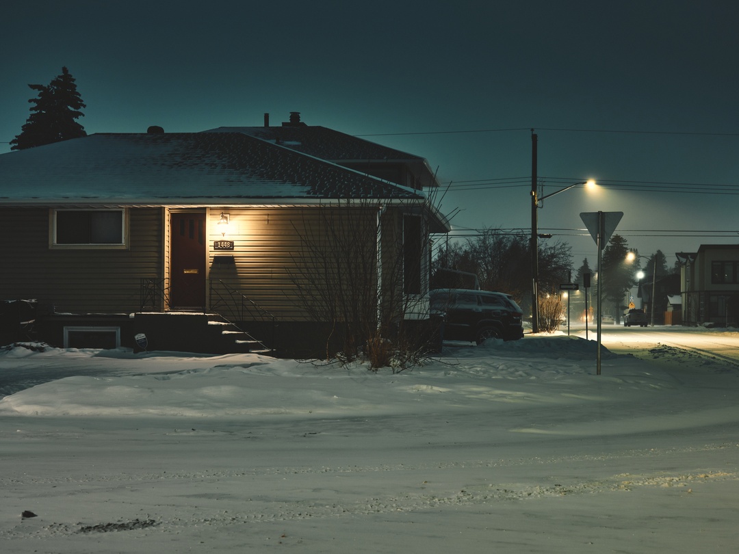 Calgary house in snow at night — winter street photography